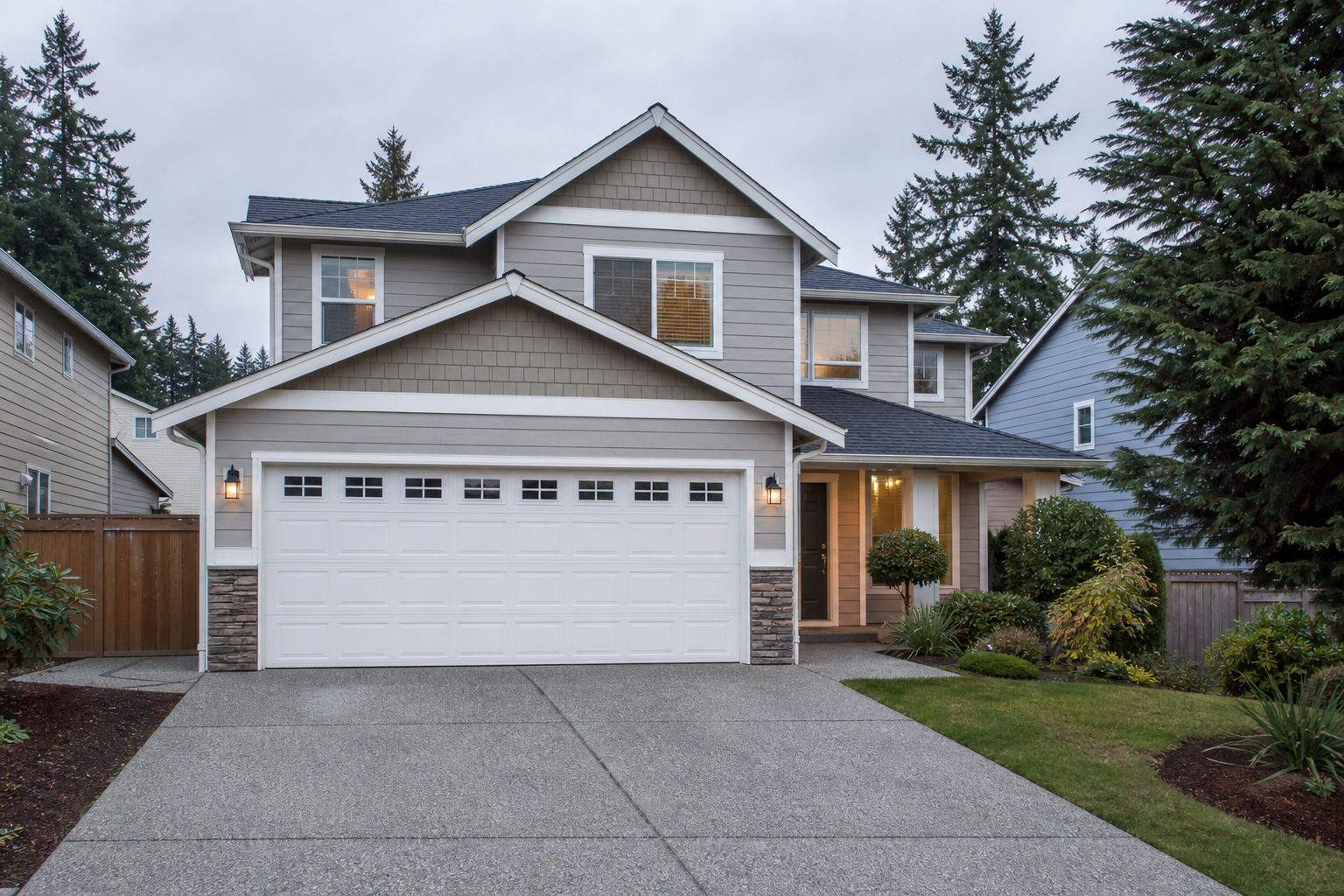 Suburban Lynnwood home with a visible garage door on an overcast day